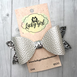 Modern bow with glitter and leatherette